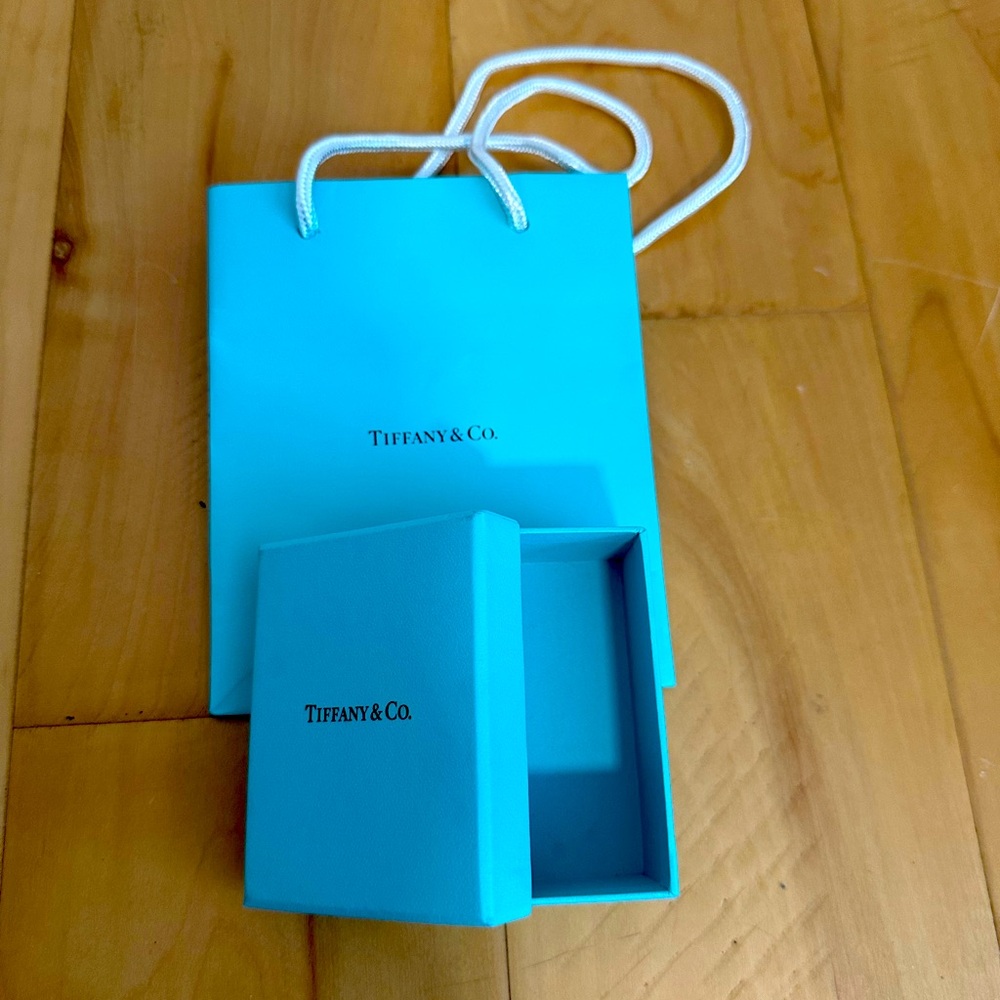 Tiffany & Co. a gift box and a bag